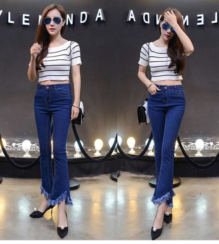 Jeans ống loe xé gấu tua rua