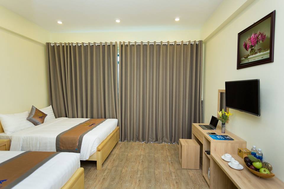 Một căn phòng trong Nam Á hotel với màu sắc nhã nhặn 
