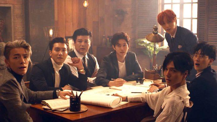 Super Junior đóng vai những người truy tìm kẻ trộm trong MV Black Suit (Ảnh: Internet)