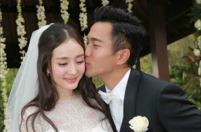 Nụ hôn ngọt ngào của Lưu Khải Uy dành cho vợ trong đám cưới. (Ảnh: Internet)