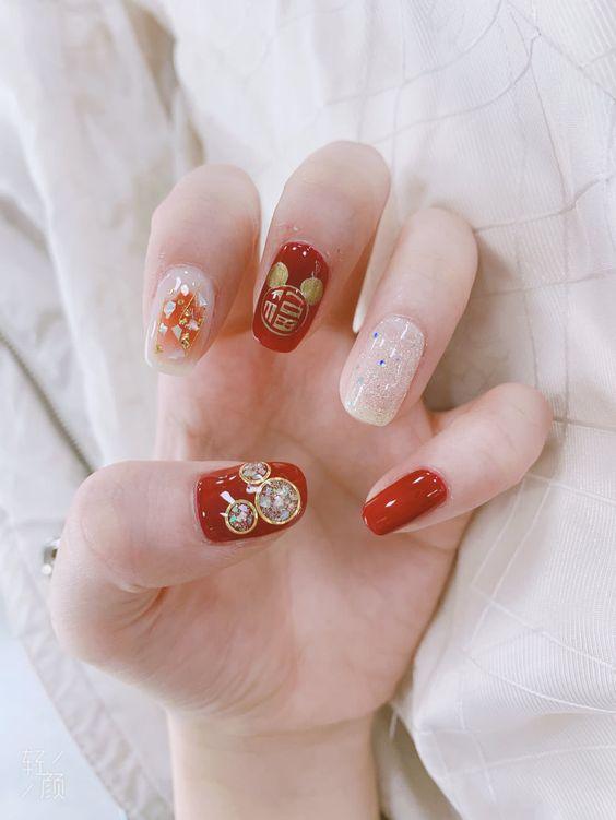 Mẫu nail đỏ may mắn cho Tết (ảnh: internet)
