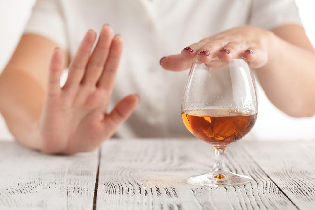 woman hand refuses to drink a alcohol