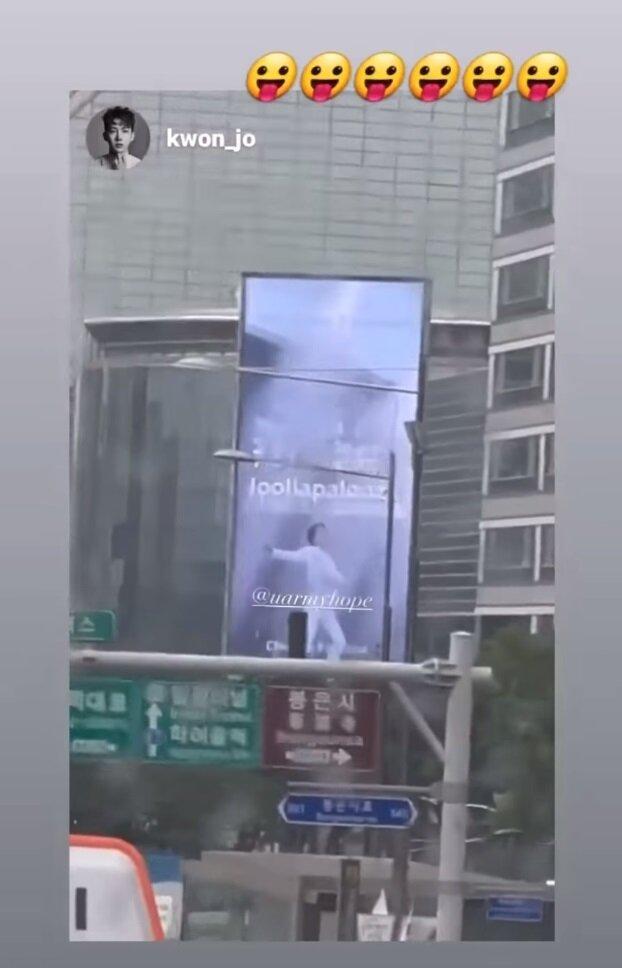 Jo Kwon đã quay video về biển quảng cáo của J-Hope. (Ảnh: Internet)