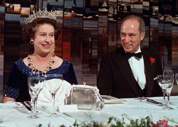Prime Minister Pierre Trudeau is seated next to Queen Elizabeth II at an offical dinner he is hosting in the Queen's honor in Vancouver, B.C. March 10, 1983. Photo by Peter Bregg/CP/ABACAPRESS.COM