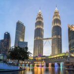 KUALA LUMPUR, MALAYSIA - Aug 21, 2015: Petronas Towers. Petronas Towers, also known as Menara Petronas is the tallest buildings in the world from 1998 to 2004.; Shutterstock ID 315627185; Departmental Cost Code : 162800; Project Code: GBLMKT; PO Number: GBLMKT