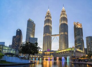 KUALA LUMPUR, MALAYSIA - Aug 21, 2015: Petronas Towers. Petronas Towers, also known as Menara Petronas is the tallest buildings in the world from 1998 to 2004.; Shutterstock ID 315627185; Departmental Cost Code : 162800; Project Code: GBLMKT; PO Number: GBLMKT