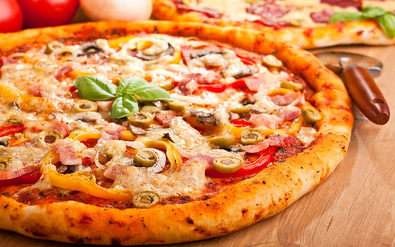 Pizza là món ăn được rất nhiều người yêu thích (Ảnh: Internet)