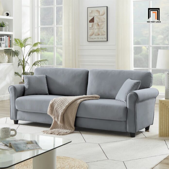 Một chiếc chăn phủ không chỉ mang lại cảm giác ấm cúng mà còn khiến sofa thêm phong cách