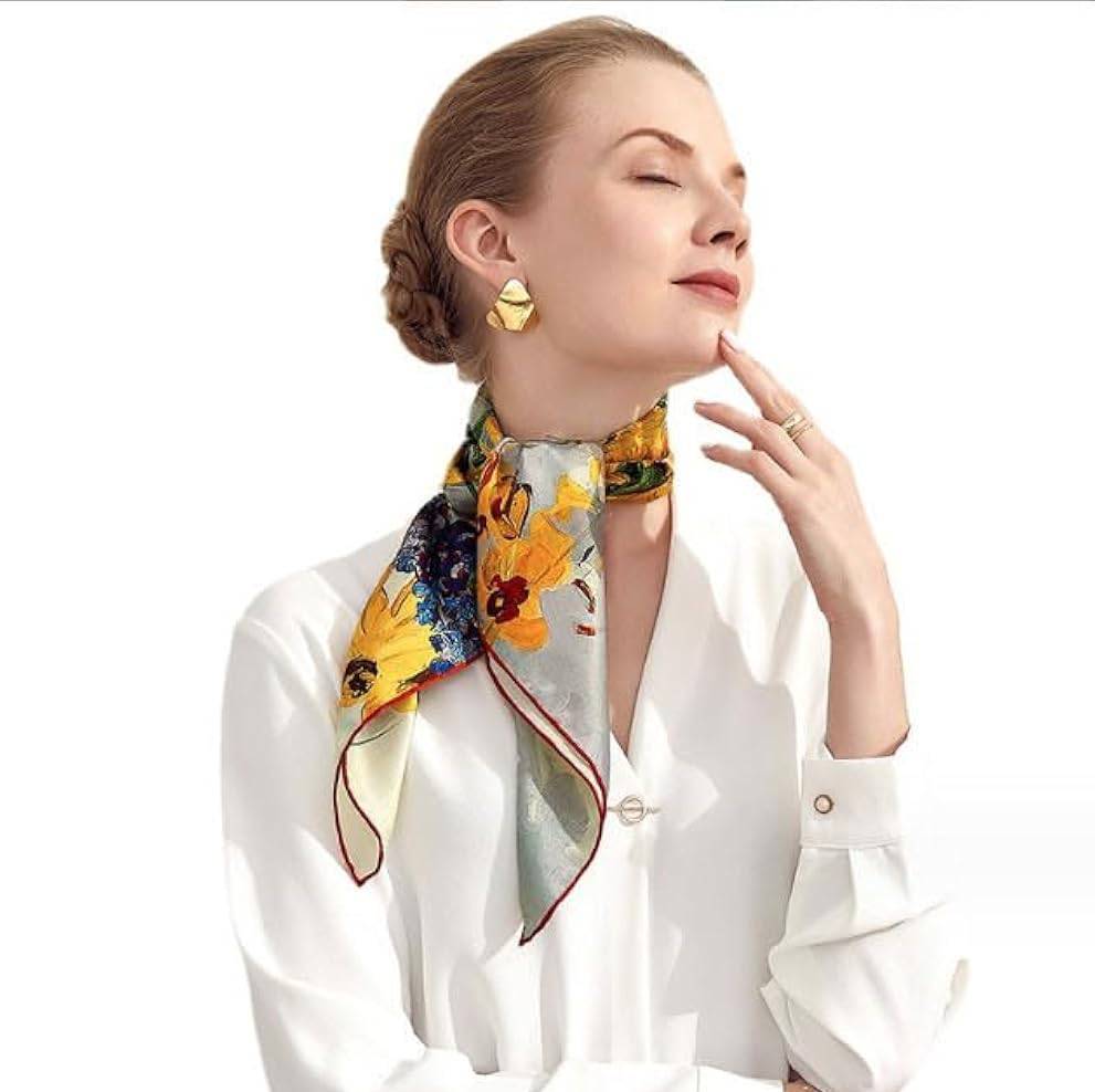 Một chiếc khăn lụa tinh tế có thể biến trang phục đơn giản trở nên cuốn hút ngay lập tức Một chiếc khăn lụa tinh tế có thể biến trang phục đơn giản trở nên cuốn hút ngay lập tức