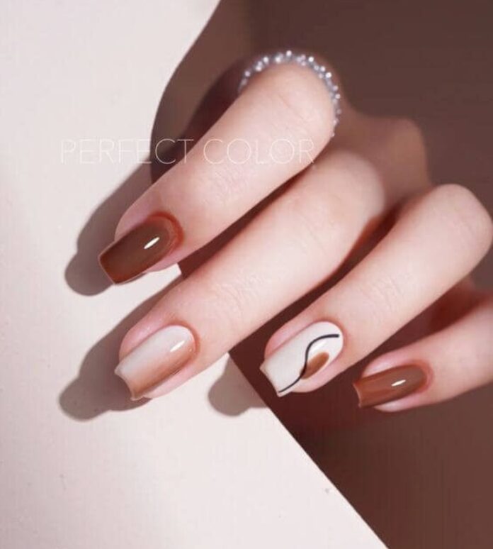 Mẫu nail tay đẹp tone nâu cam ấm áp (Ảnh: Internet)