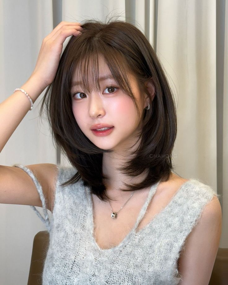 Tóc layer lửng uốn C-Curl