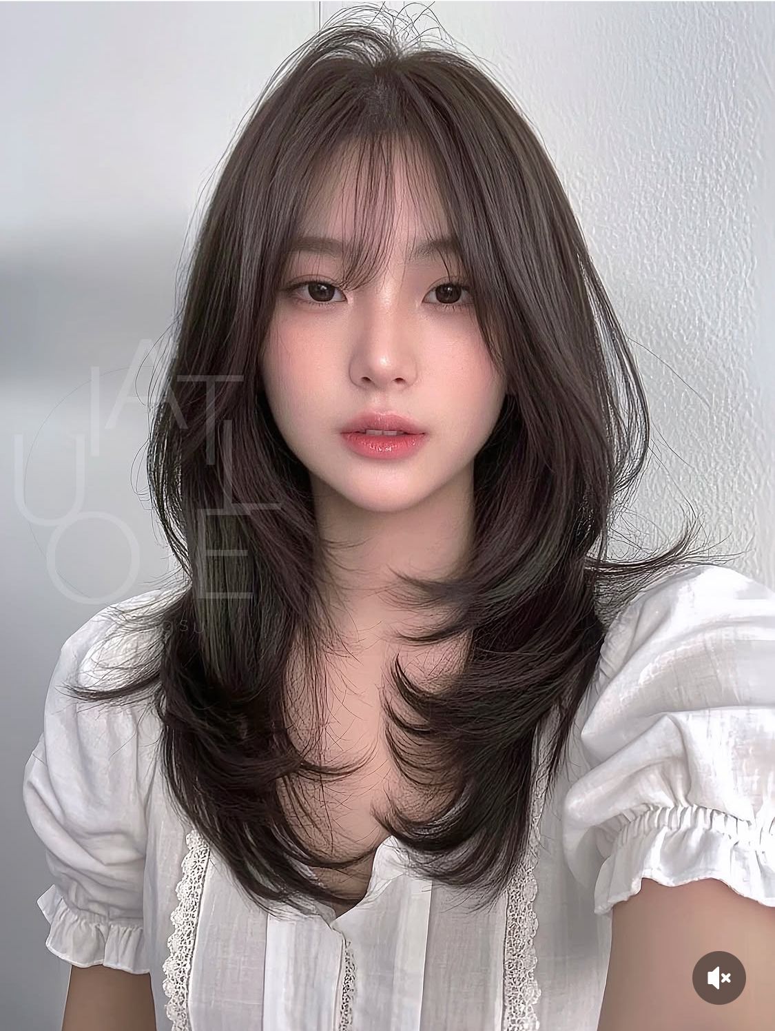 Tóc layer dài uốn đuôi lượn sóng