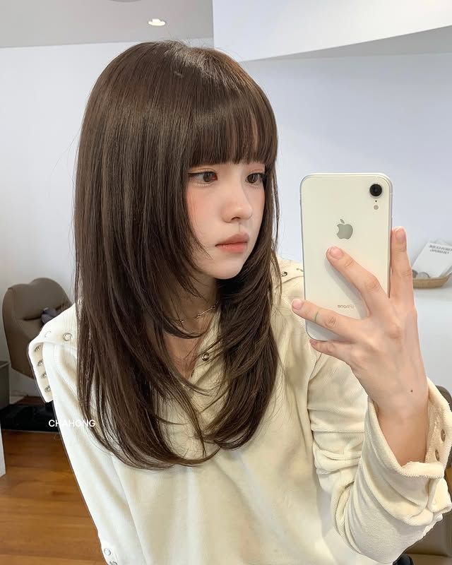 Tóc layer dài mái ngang dày