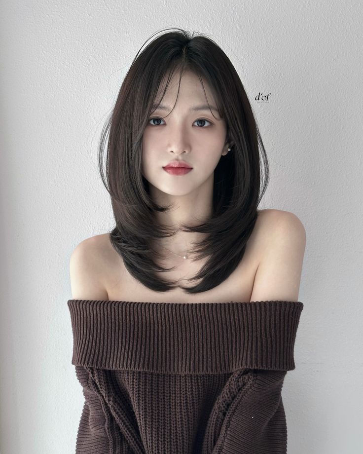 Tóc layer lửng uốn phồng oval