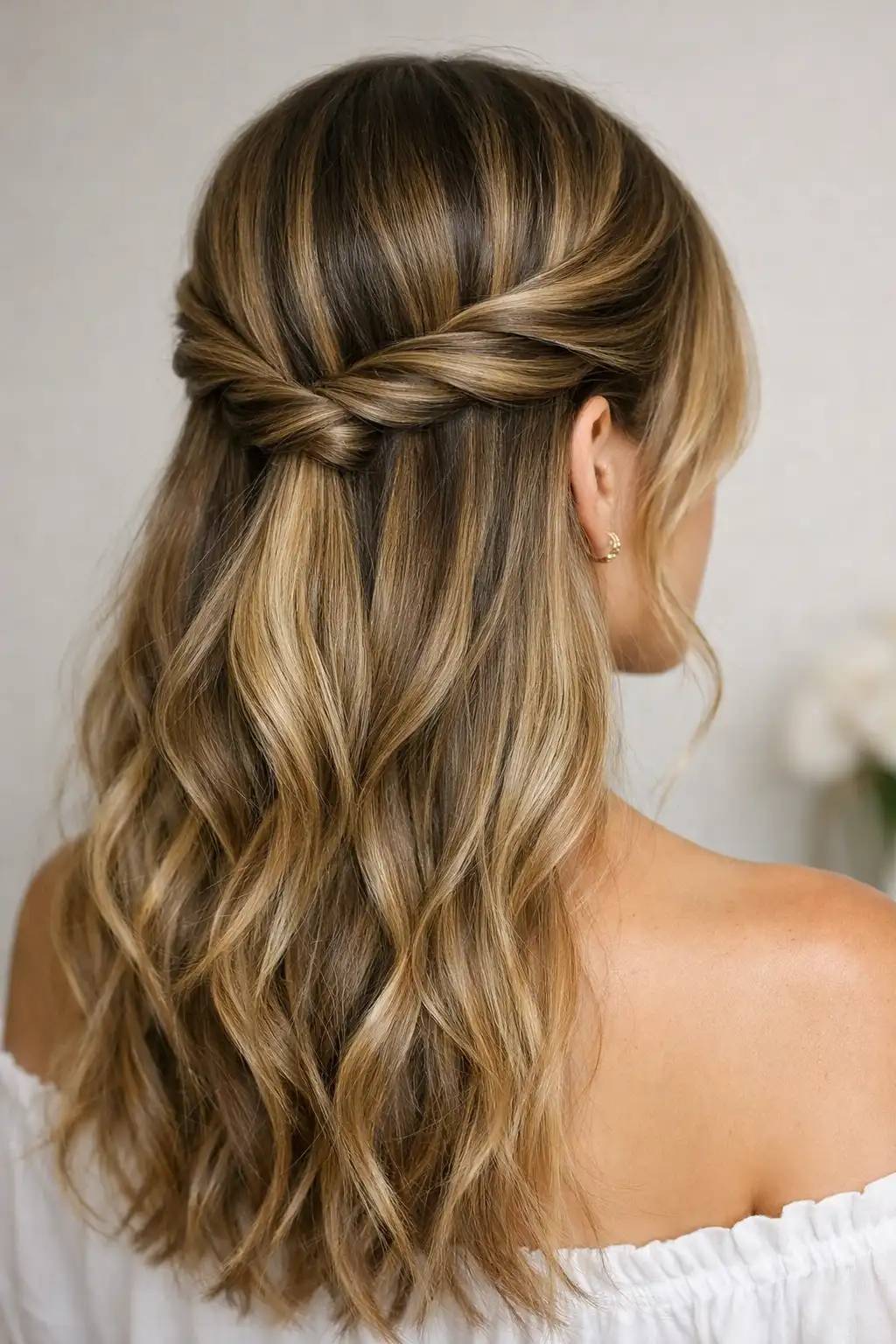 Búi nửa đầu xoắn vương miện