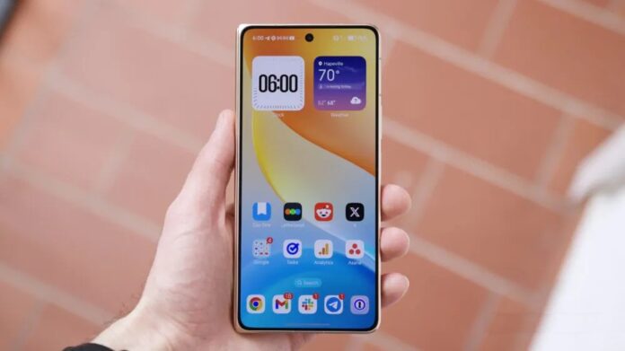 Điện thoại HONOR Magic V6 với màn hình ngoài đang bật (Ảnh: Internet) Điện thoại HONOR Magic V6 với màn hình ngoài đang bật (Ảnh: Internet)